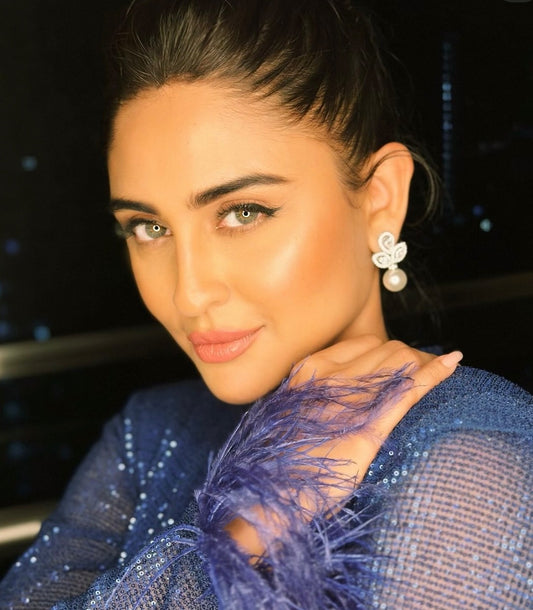 Krystle D’Souza pearl drop earrings